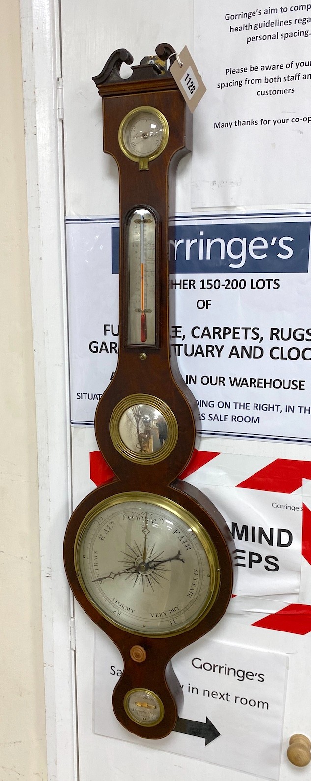 An early 19th century mahogany wheel barometer, height 96cm